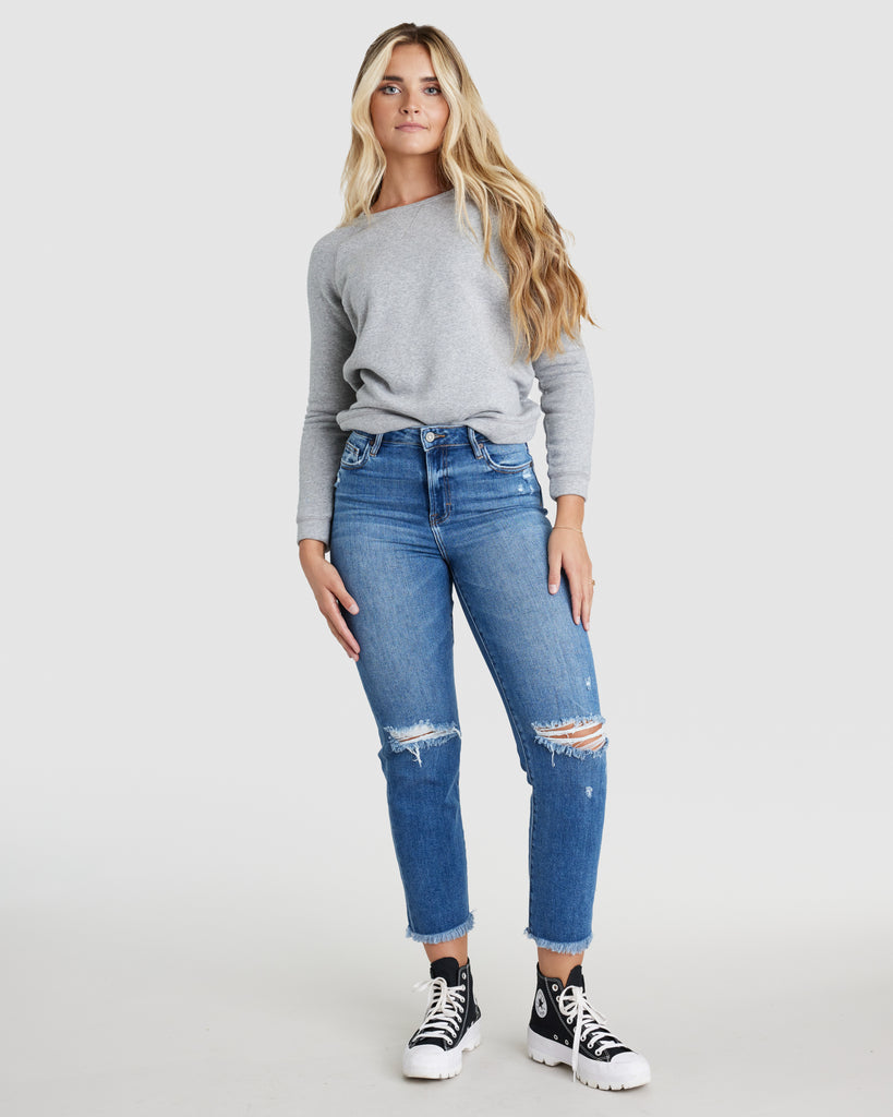 Woman in blue denim, skinny jeans